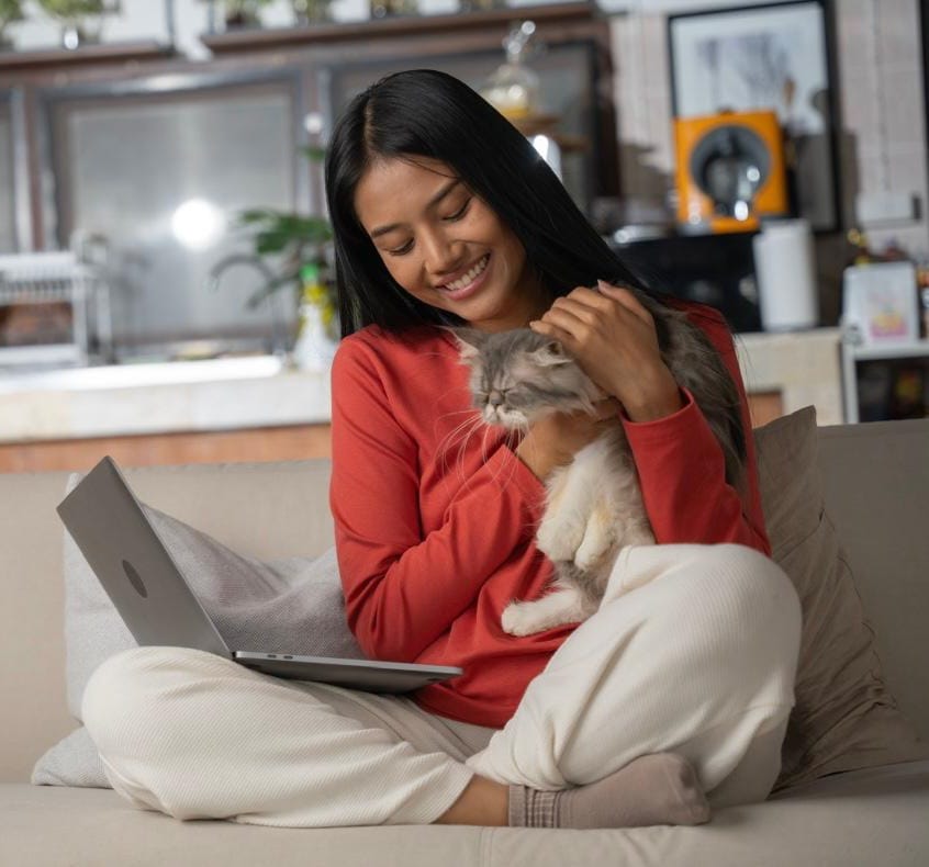 Happy pet owner with dog